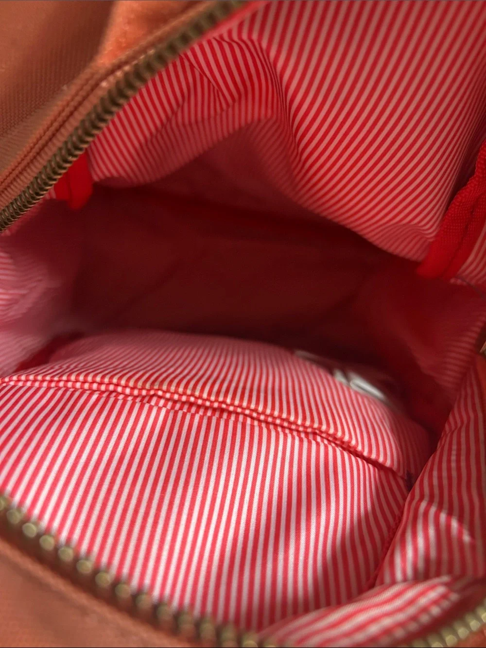 This coral-pink Herschel Nova Mini Backpack